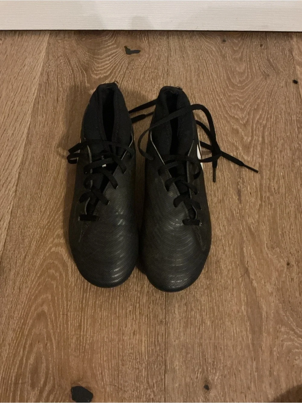 adidas Black Cleats with White Stripes and Blue Studs